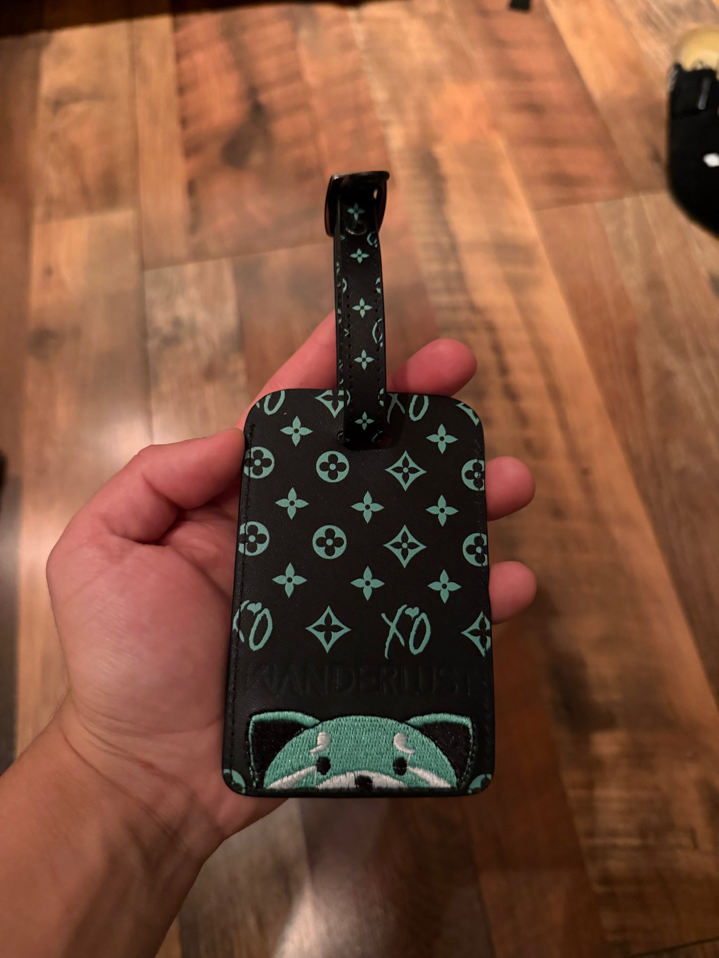 Wanderlust luggage tag sample