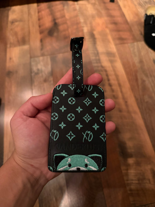 Wanderlust luggage tag sample