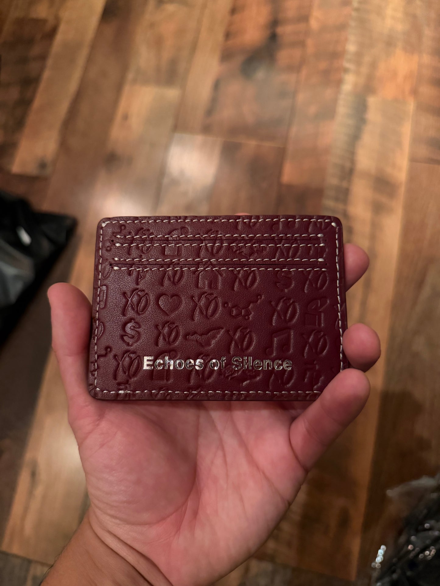Echoes of Silence (embossed) cardholder sample